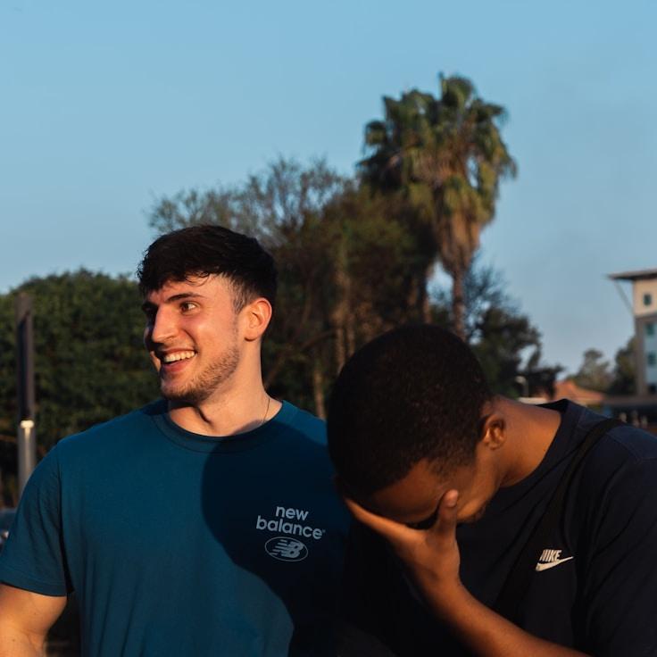 New name, Lead Design Curator at Pacific Sky Gateway Zone, reviewing corporate floral arrangements